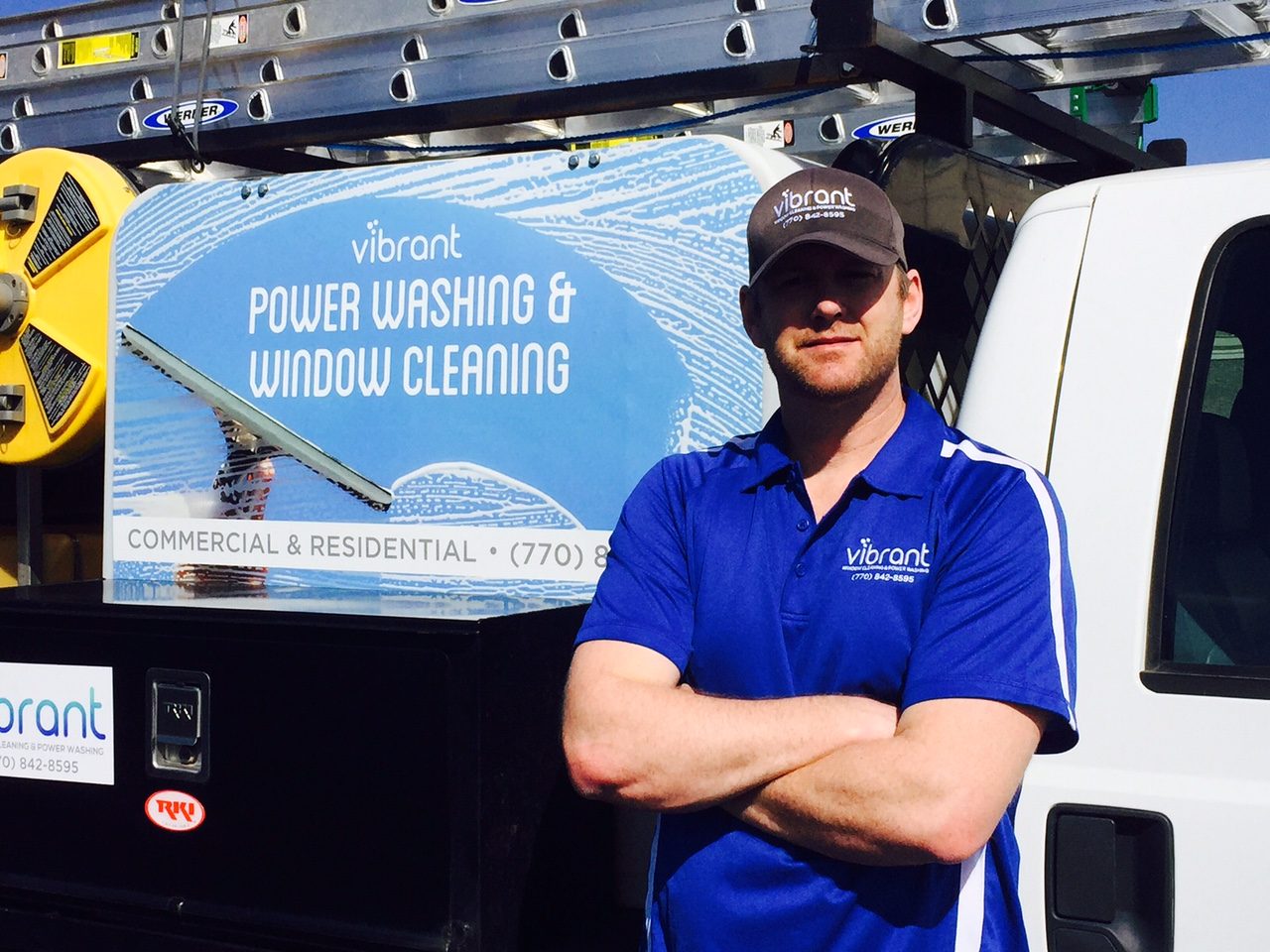 Vibrant crew member with the service truck
